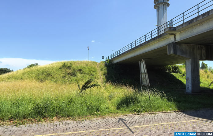 short cut grass verge up to Houtribsluisbrug bridge in Lelystad